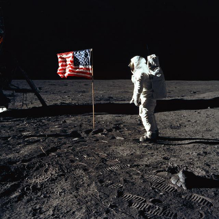 Buzz Aldrin saluting the American flag on the moon
